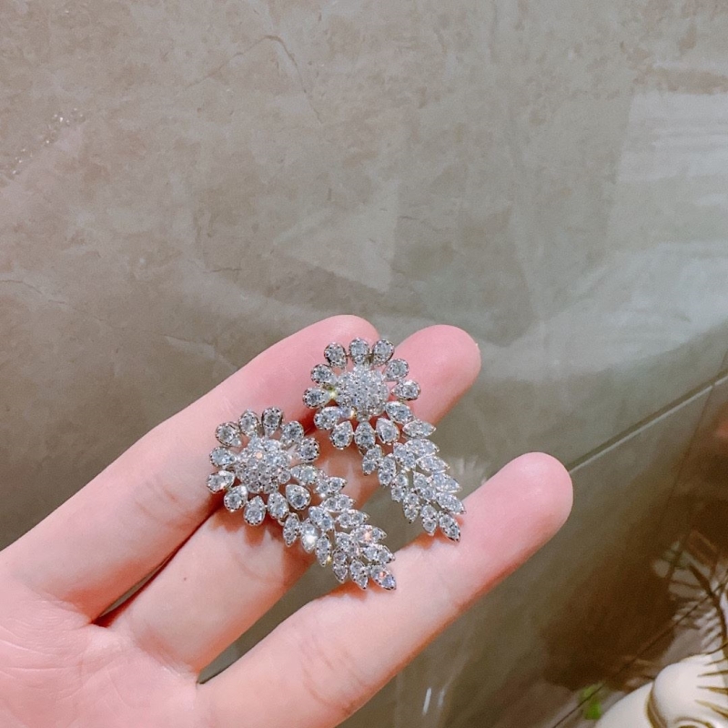 T*f*ny earrings